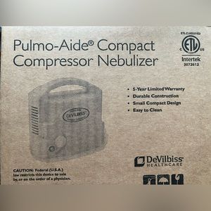 Pulmo-Aide® Compact Compressor Nebulizer- new in box. Never opened.